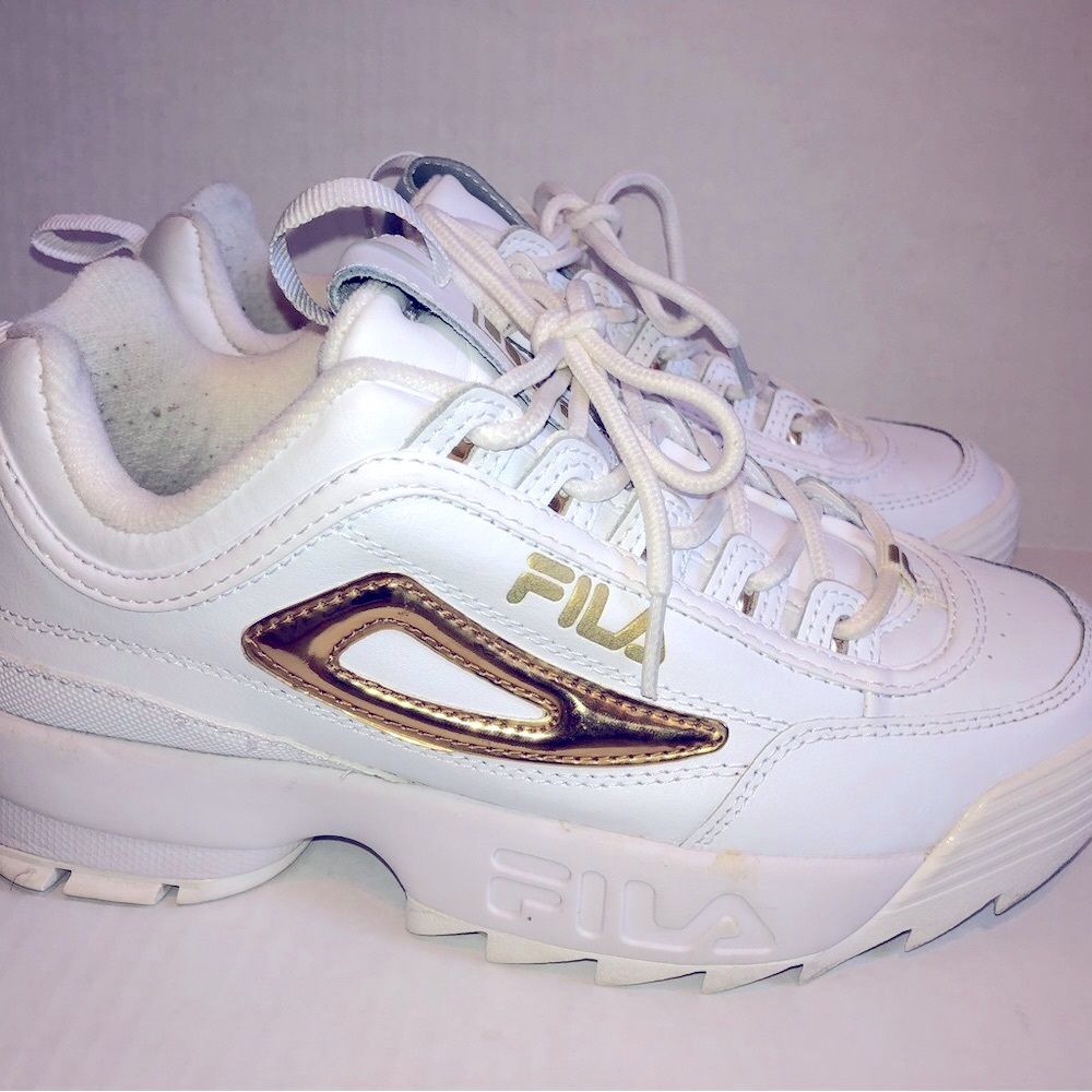 Fila Disruptor 2 Sz 9M White leather with shiny gold logo worn twice. Stylish